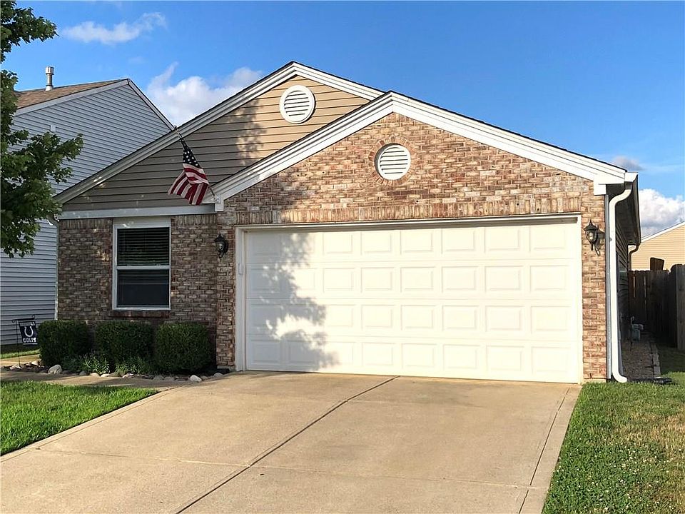Front of Home featuring a 2 Car garage.