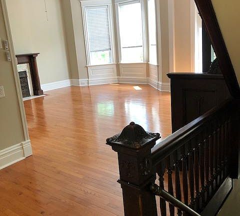 Spacious, open air foyer to huge living room. Bay window with new hardwoods.