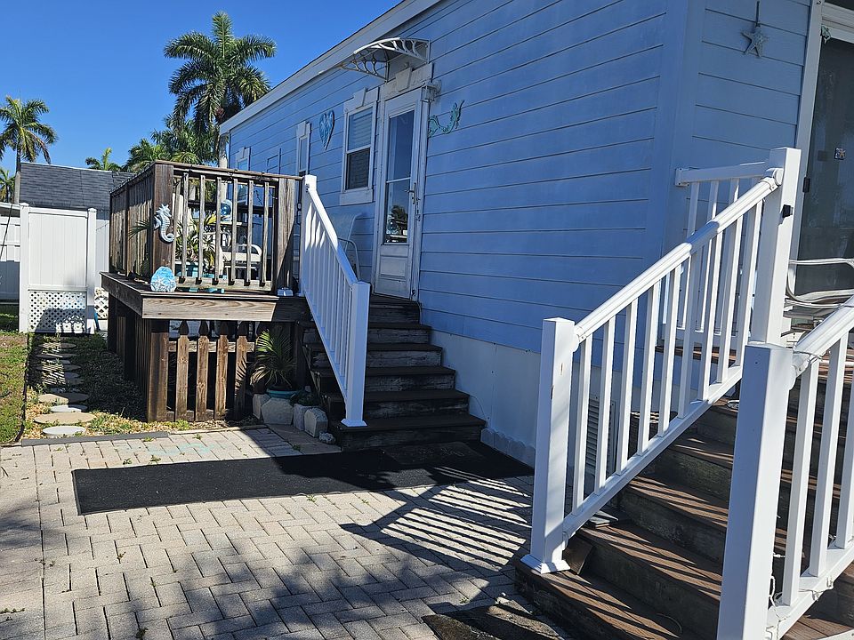 Deck with table and chairs, and lounge chair