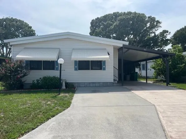 717 Periwinkle Cir, Barefoot Bay, FL 32976