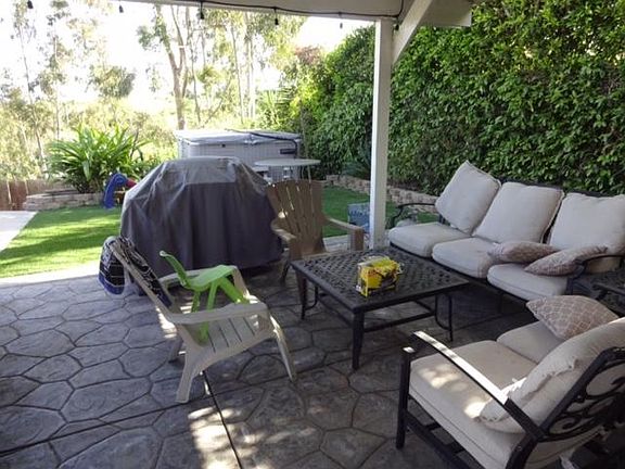 Patio area adjoining pool