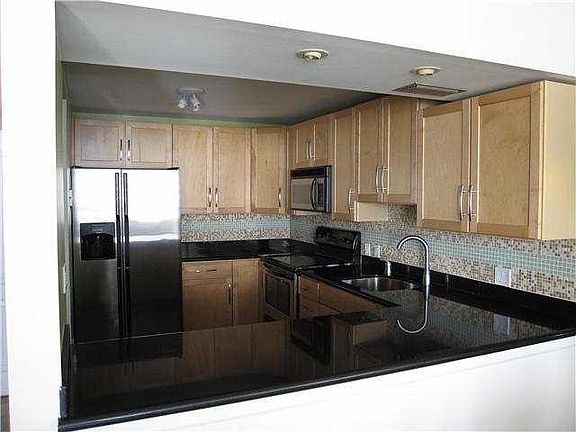2nd image of 3675 N Country Club Dr APT 1103