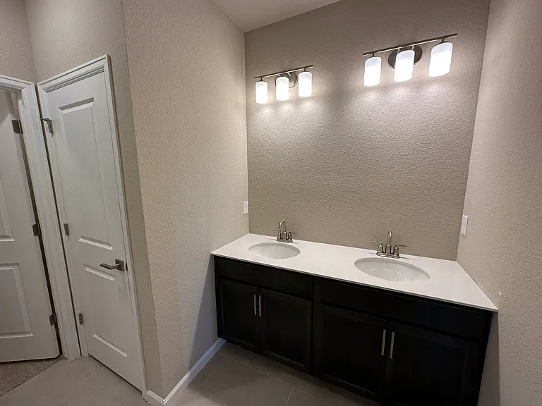 Master bath - double vanity, walk in closet and shower
