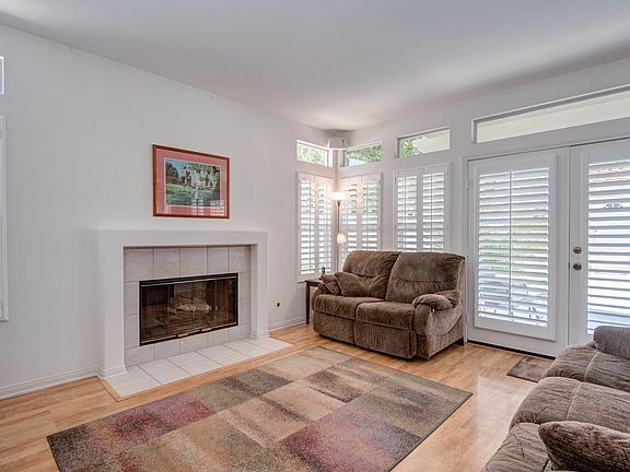 Family room with wood/laminate floors.
