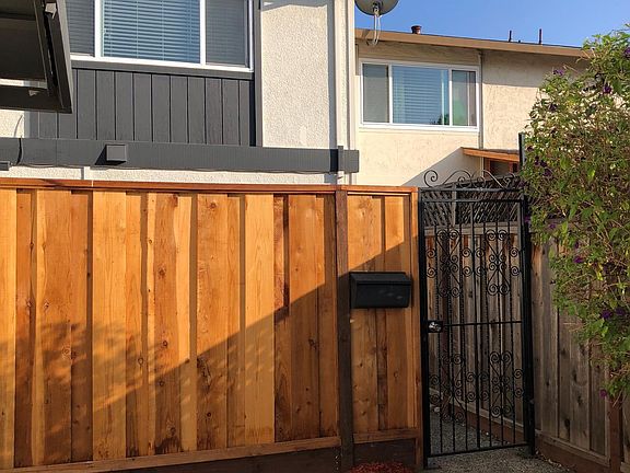 Gated entrance to front door courtyard.