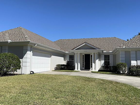 Street view. Home is located at the end of the street with recreation facilities. There is no drive thru traffic into the neighborhood so the home is set back and quiet.