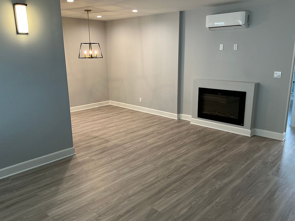Recently upgraded living and dinning area. View from the front door entryway.