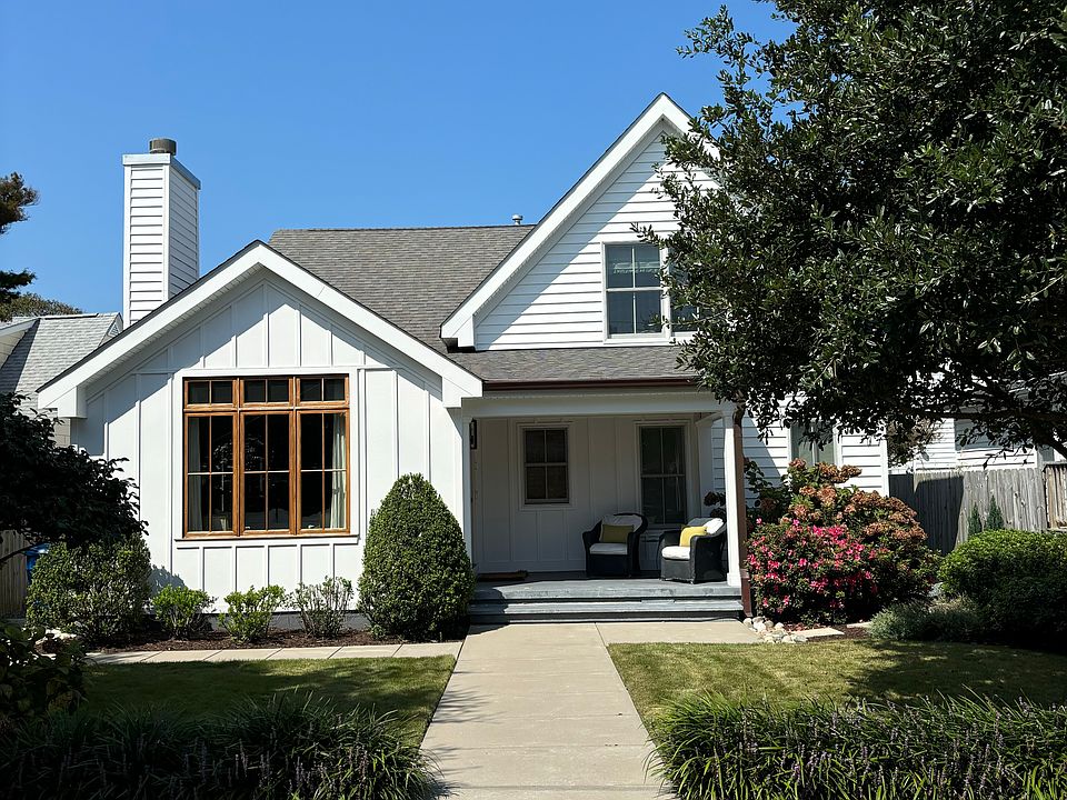 Enjoy Southern exposure and lively neighborhood from front porch