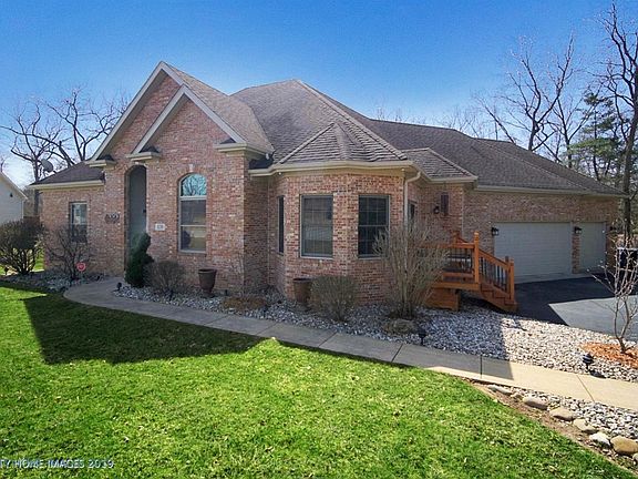 Side entrance has a new deck, railing and Anderson patio door.