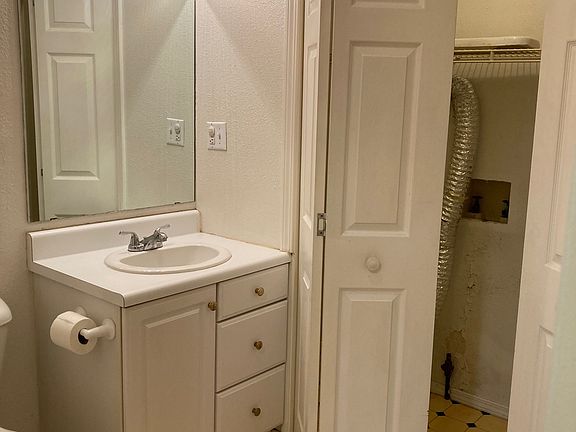 Main floor half bath and laundry room