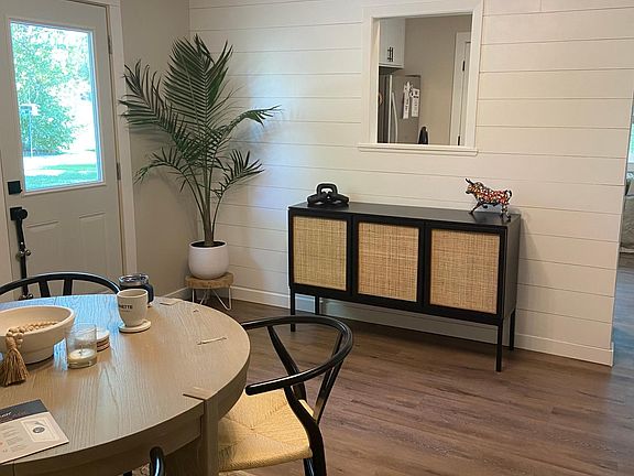 Dining area with shiplap accent wall