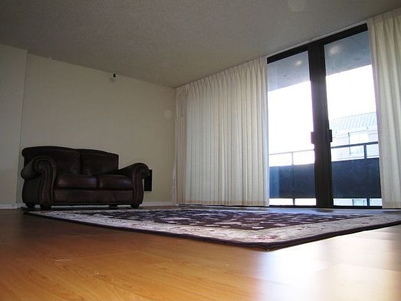 living room leads to balcony