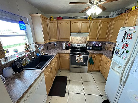 3rd image of 681 NE 8th Ct