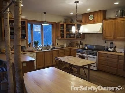 Front of the House
						:
						Looking south at the north face of the house