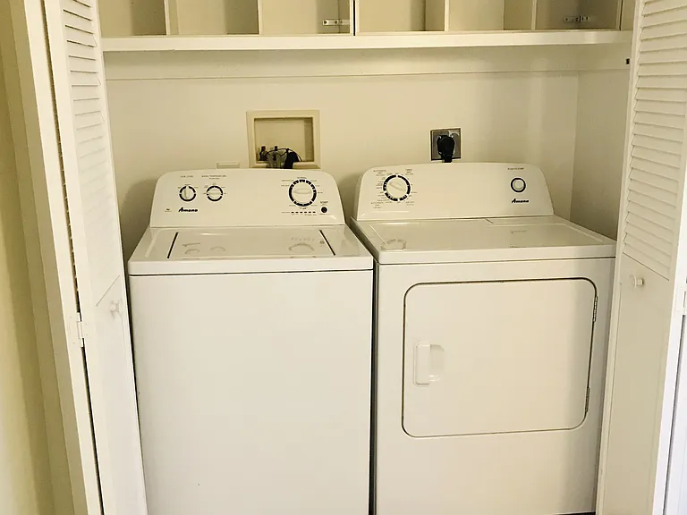 The apartment has its own washer dryer.