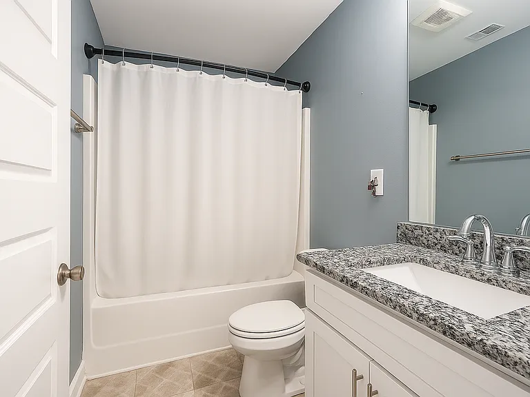 You own, private bathroom includes a shower and tub.