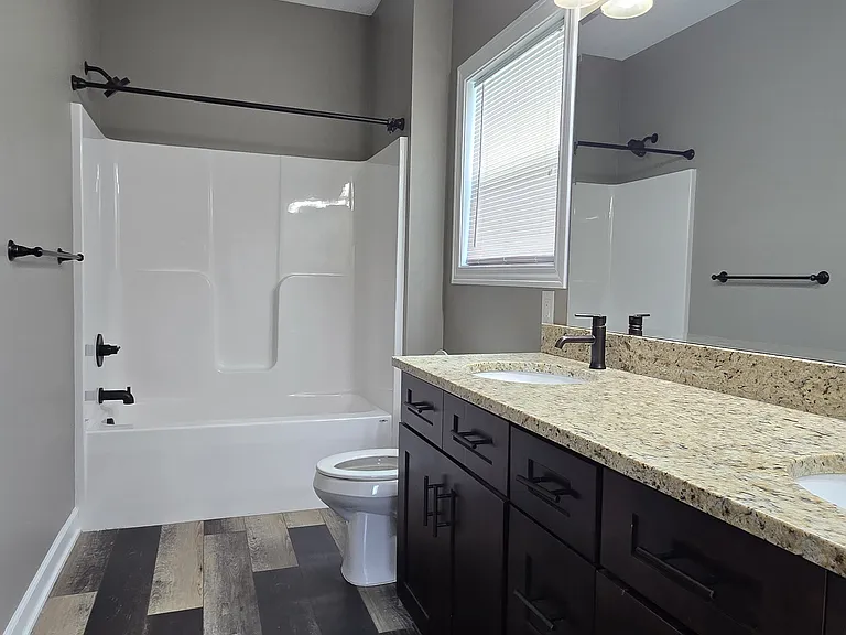 Master bathroom with his/hers sink with granite