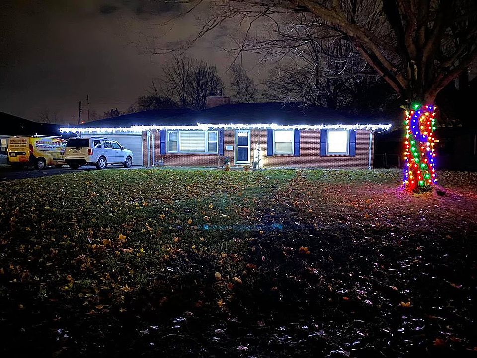 Front of house at night 