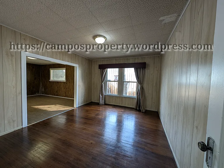 Bedroom with attached large office.