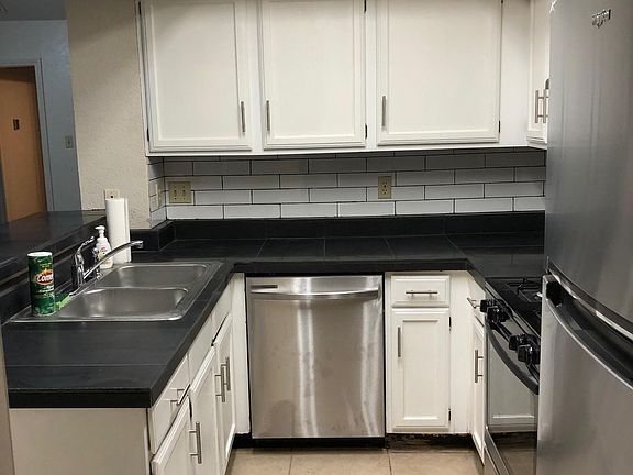 Kitchen with stainless steel appliances