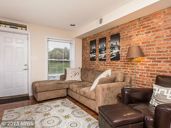Exposed Brick and Hardwoods!