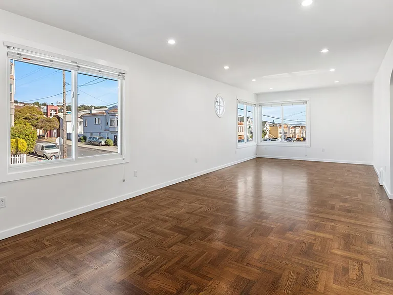 Dining room and living room get plenty of sunlight