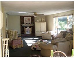 spacious bright family room with hardwoods