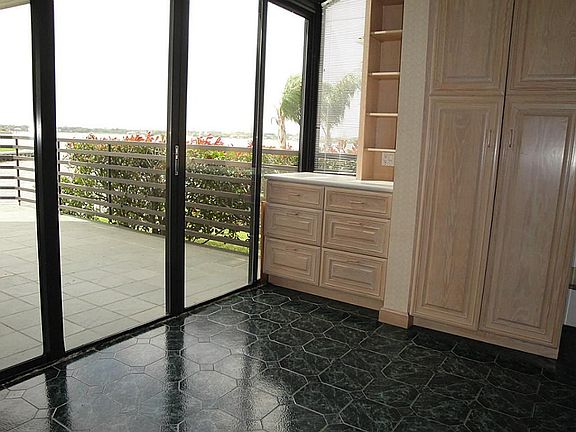Morning coffee will take on a whole new enjoyment watching the sunrise in this bright breakfast nook.