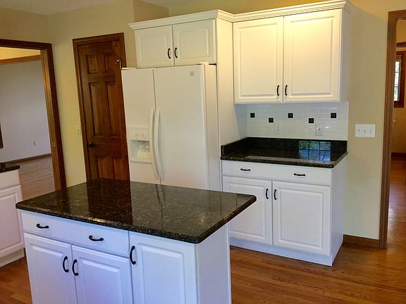 Other view of kitchen - separate pantry too just next to the refrigerator