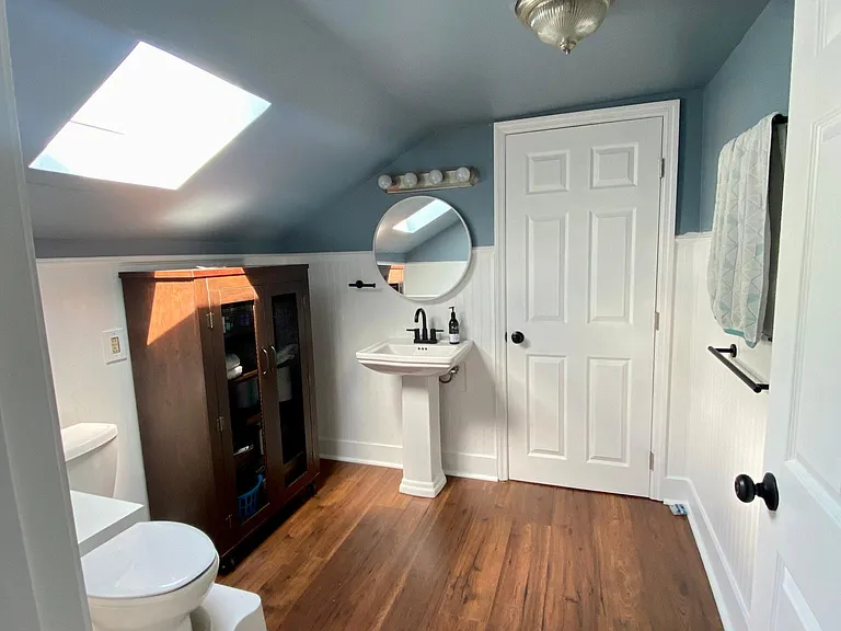 Spacious upstairs bath with new marble-floored shower