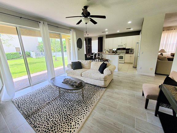 Family room open to kitchen and dinette area
