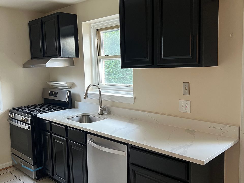 Completely upgraded Kitchen - just installed granite countertops, new oven, new exhaust fan and dishwasher. Cabinets less than two years old.