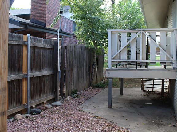 Side yard - deck has since been overhauled and refinished in a carbon gray color