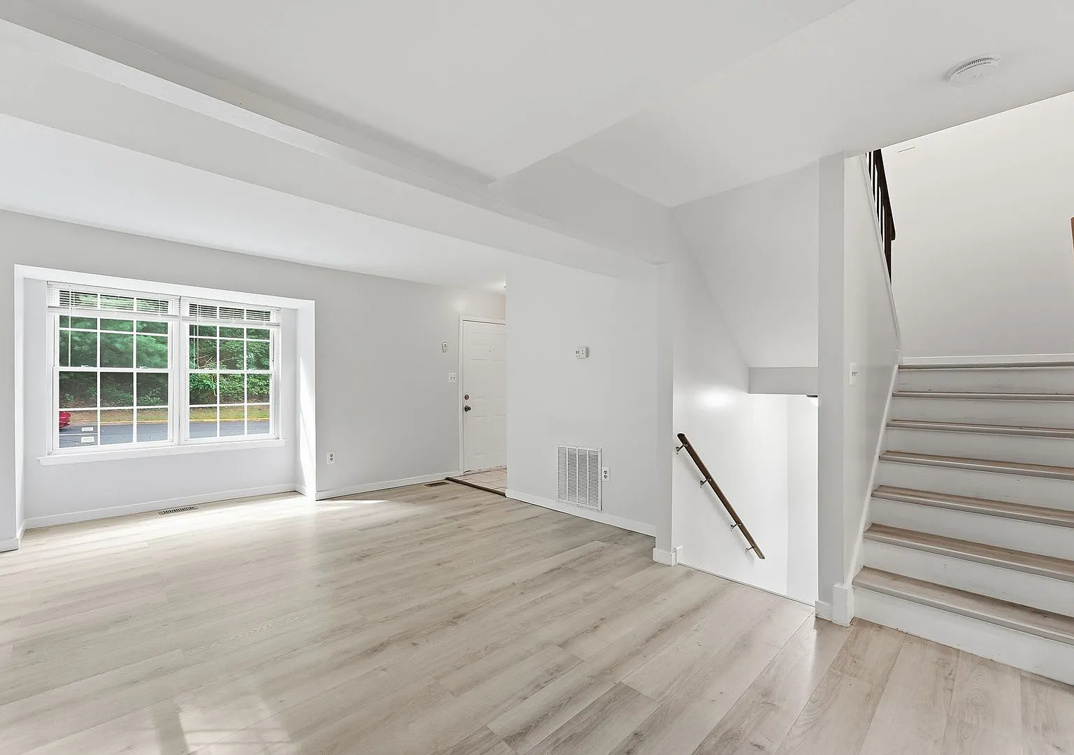 Welcome home to this beautifully updated end unit residence that combines modern finishes with sp... — Photo 4