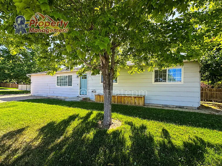 7703 S Mistyglen Ave — Photo 1