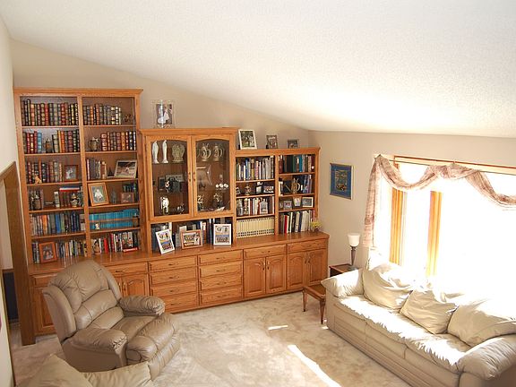 Sharp built-in unit in vaulted living room.
