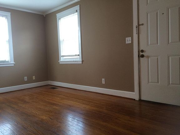 original hardwood floors, and fixtures, newly painted throug