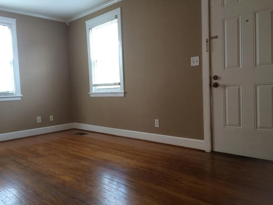 original hardwood floors, and fixtures, newly painted throug