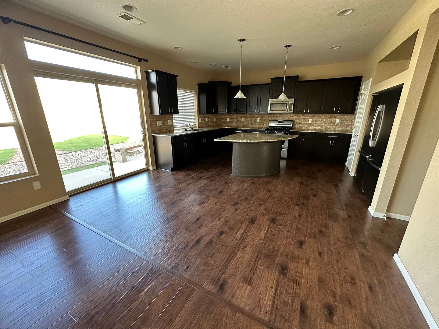 Spacious 4-Bedroom Home with Fenced Backyard, Central A/C & 2-Car Garage! — Photo 3