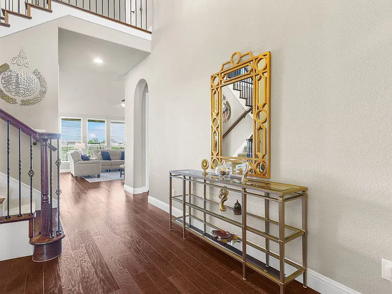 Dedicated office + utility room & garage to the left of the staircase.