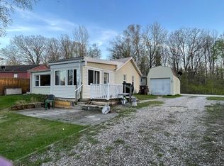 761 S Coolidge Dr, Six Lakes, MI 48886