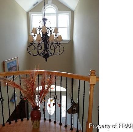 Juliet balcony overlooks foyer