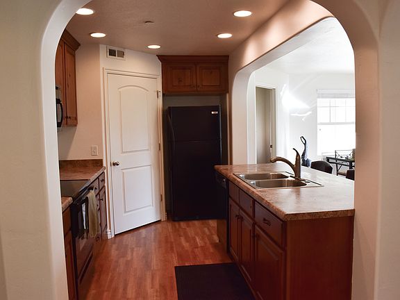 Kitchen - living room and dining areas are to the right