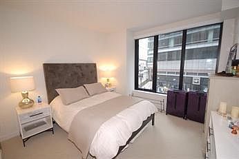 Spacious bedroom fits a king
