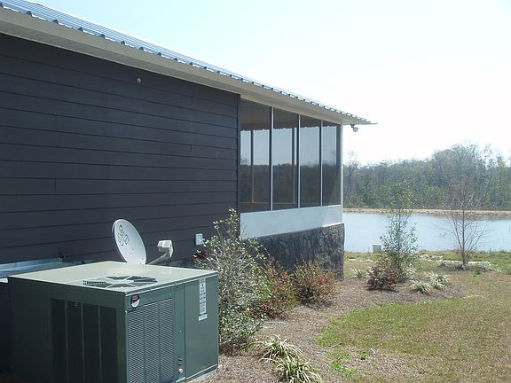 West side of house w/ HVAC