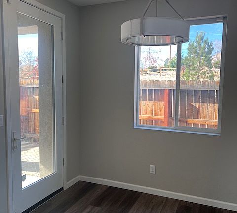 Dining area with access to private patio.