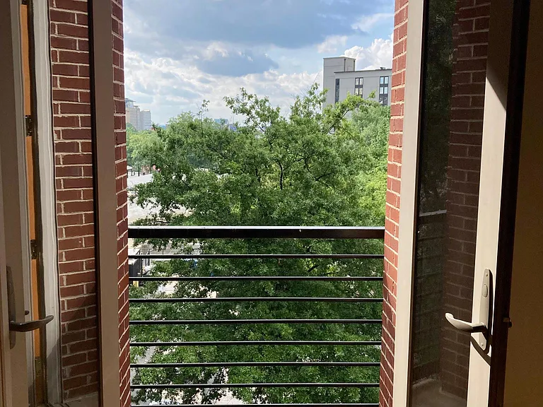 There is a Juliette balcony, perfect for plants. As a plus, it has one of the best views of the fireworks at Centennial Olympic Parks of any home in the city.
