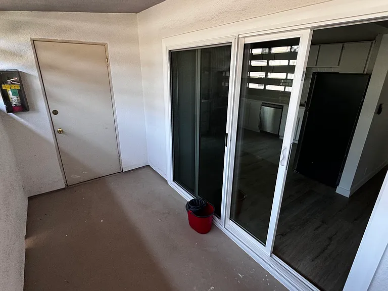 Patio with storage behind that door.