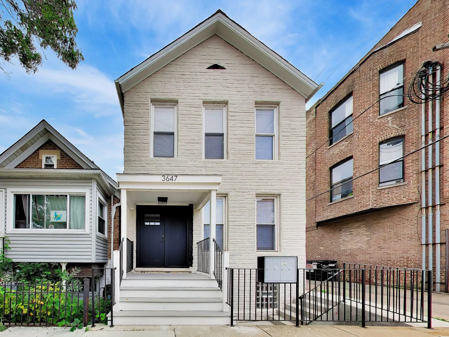 3647 S Wallace St — Photo 1