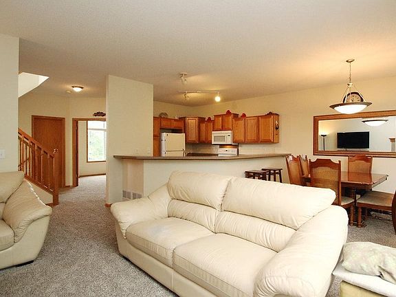 Open flowing floorplan, large kitchen, ample space for stools for informal eating